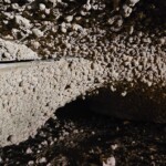 Cave covered with mud dauber nests