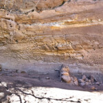 Houses and tombs along bench
